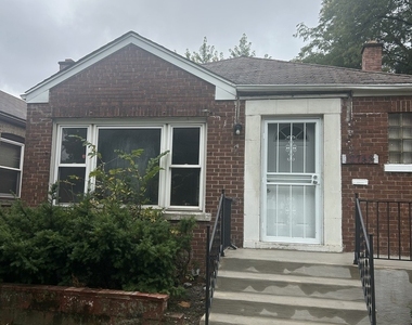 12748 S Lowe Avenue - Photo Thumbnail 2