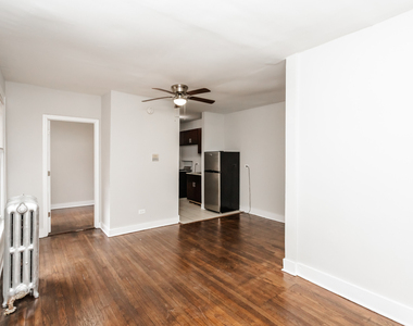 6949 S Paxton Avenue - Photo Thumbnail 1