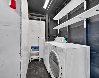 210 W 13th Street - Photo Thumbnail 30