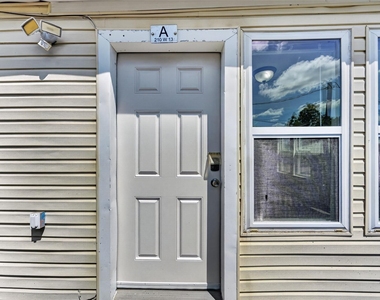 210 W 13th Street - Photo Thumbnail 8