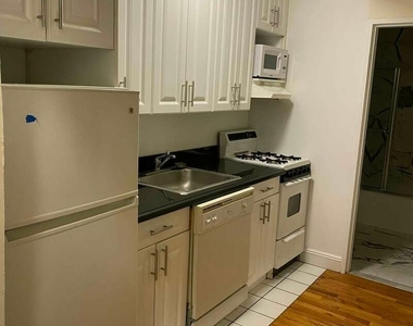 East 83 Street - Photo Thumbnail 2