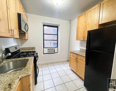East 124th Street - Photo Thumbnail 1