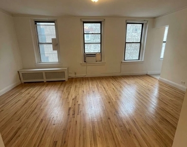 E 58th St - Photo Thumbnail 1