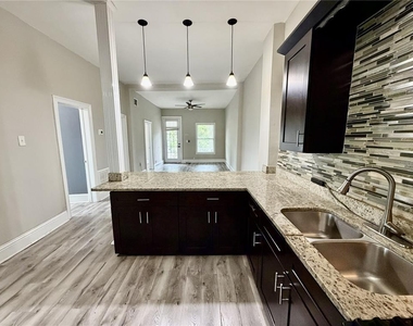 7101 N Taliaferro Avenue - Photo Thumbnail 5