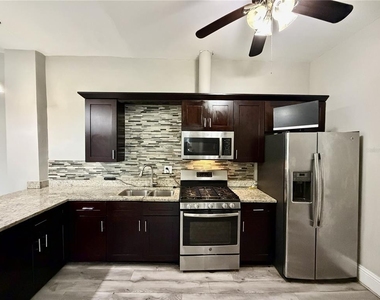 7101 N Taliaferro Avenue - Photo Thumbnail 2