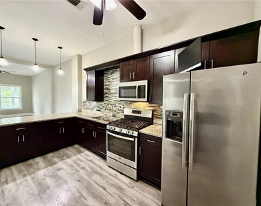 7101 N Taliaferro Avenue - Photo Thumbnail 3