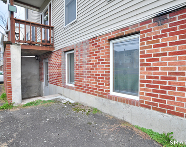 1681 Litchfield Turnpike - Photo Thumbnail 2