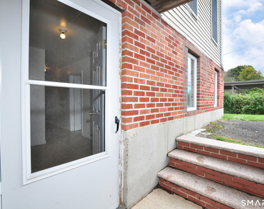 1681 Litchfield Turnpike - Photo Thumbnail 4