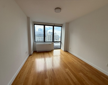 11th St & West 57th Street - Photo Thumbnail 4