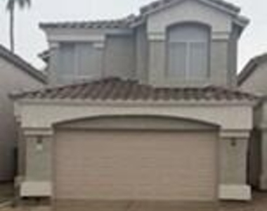 4909 W Behrend Drive - Photo Thumbnail 1