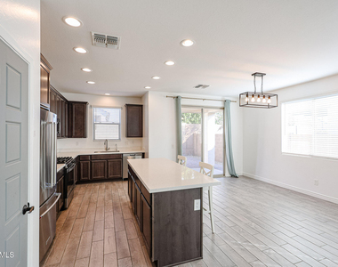 14426 W Cottontail Lane - Photo Thumbnail 6