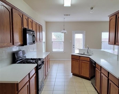 9509 Crooked Cat Drive - Photo Thumbnail 9