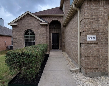 9509 Crooked Cat Drive - Photo Thumbnail 3