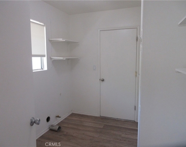 24300 Hatteras Street - Photo Thumbnail 8
