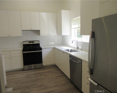 24300 Hatteras Street - Photo Thumbnail 7