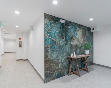 10918 Camarillo Street - Photo Thumbnail 19