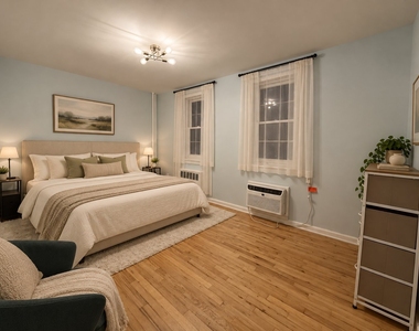 311 E 25th Street - Photo Thumbnail 2