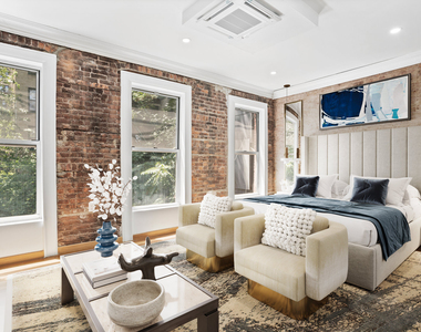 328 W 46th Street - Photo Thumbnail 5