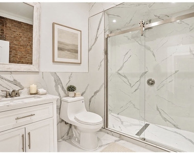 328 W 46th Street - Photo Thumbnail 6