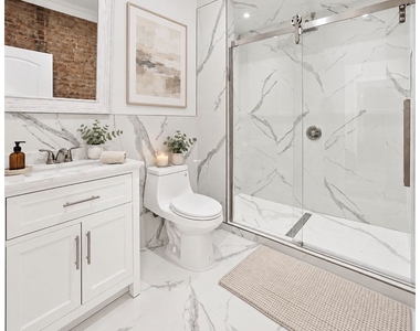 328 W 46th Street - Photo Thumbnail 4