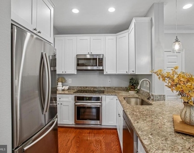 1571 Spring Gate Drive - Photo Thumbnail 6