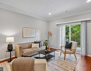1571 Spring Gate Drive - Photo Thumbnail 3