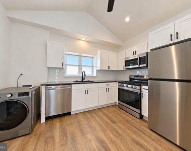 7105 Ridge Ave - Photo Thumbnail 2