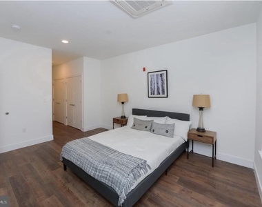 1214 N American Street - Photo Thumbnail 2