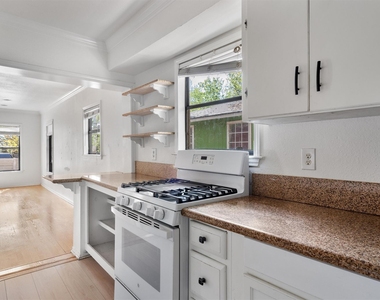 2710 E 3rd St - Photo Thumbnail 2