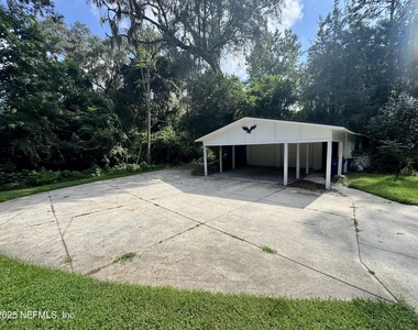 1692 E Holly Oaks Lake Road E - Photo Thumbnail 24