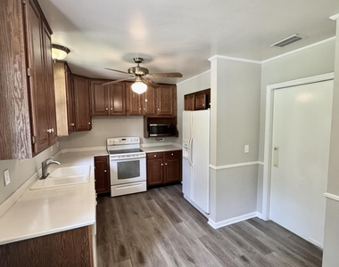 1692 E Holly Oaks Lake Road E - Photo Thumbnail 6