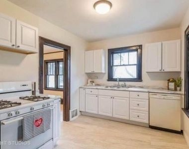 1102 S Cora Street - Photo Thumbnail 2