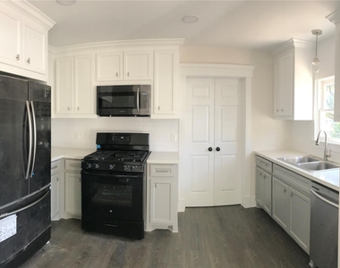 1104 E 26th Street - Photo Thumbnail 5
