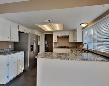 11218 Angelique Drive - Photo Thumbnail 3