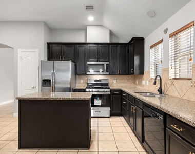 11010 Starling Creek Drive - Photo Thumbnail 14