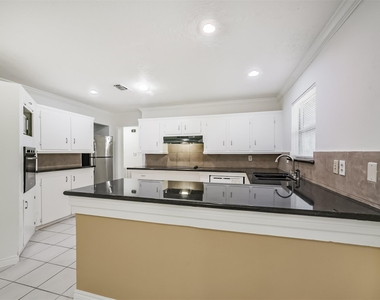 8711 Birdwood Road - Photo Thumbnail 14