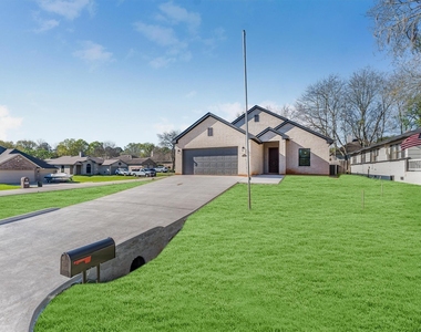 10703 Hillside Drive - Photo Thumbnail 1