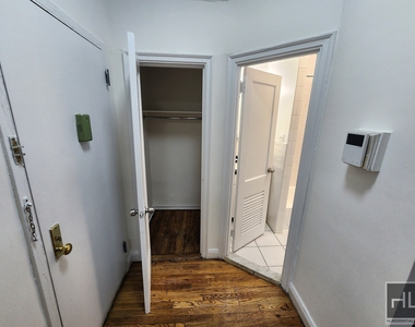 E 58th St - Photo Thumbnail 4