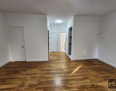 E 58th St - Photo Thumbnail 2