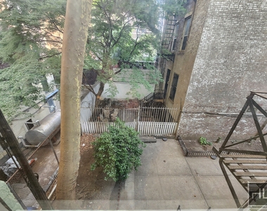 E 58th St - Photo Thumbnail 1