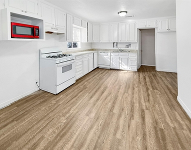 1009 E 11th Street - Photo Thumbnail 5