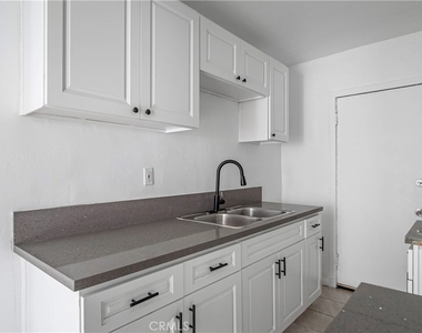 1127 E 67th Street - Photo Thumbnail 6