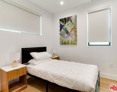 2815 1/2 S Redondo Boulevard - Photo Thumbnail 4