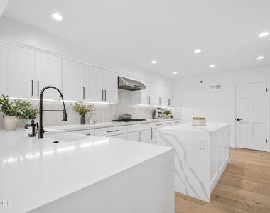 1725 Royal Saint George Drive - Photo Thumbnail 2
