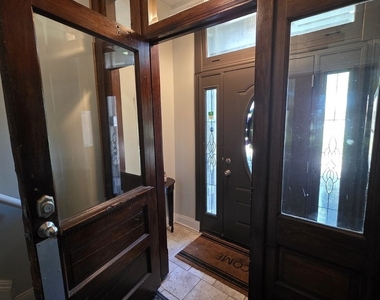 517 E 46th Place - Photo Thumbnail 1