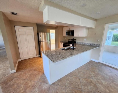 7146 Carmel Avenue - Photo Thumbnail 6