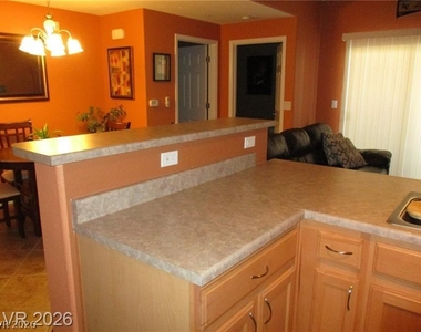 8777 W Maule Avenue - Photo Thumbnail 4