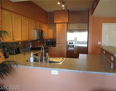8777 W Maule Avenue - Photo Thumbnail 6