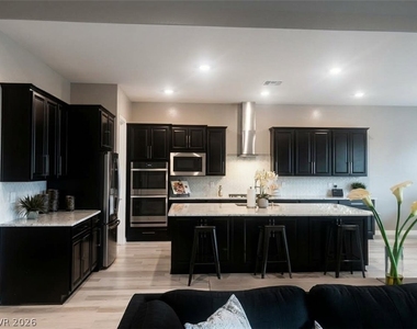 10077 Mountain Foothills Avenue - Photo Thumbnail 2