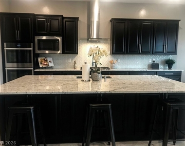 10077 Mountain Foothills Avenue - Photo Thumbnail 3